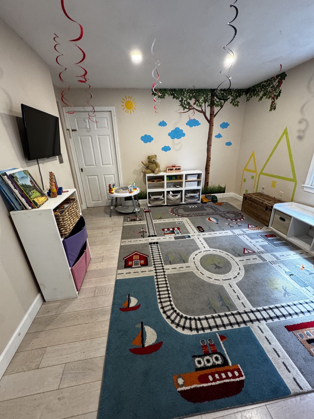 Playroom with road and train rug